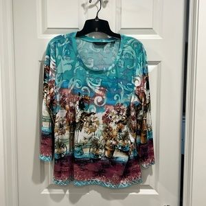 Decorative blouse by investments. Floral/flowerpots on the blouse.